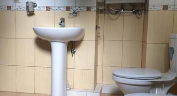 Фото номера Номер-студио с кроватью размера &quot;king-size&quot; и диван-кроватью Гостевой дом Comfort г. Ольгинка 3