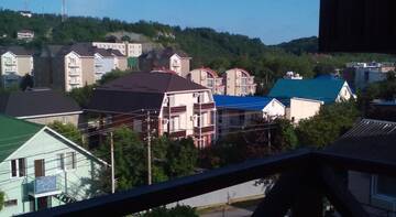 Фото номера Двухместный номер с 1 двуспальной кроватью и дополнительной кроватью Гостевой дом Novyi Sezon г. Ольгинка 5